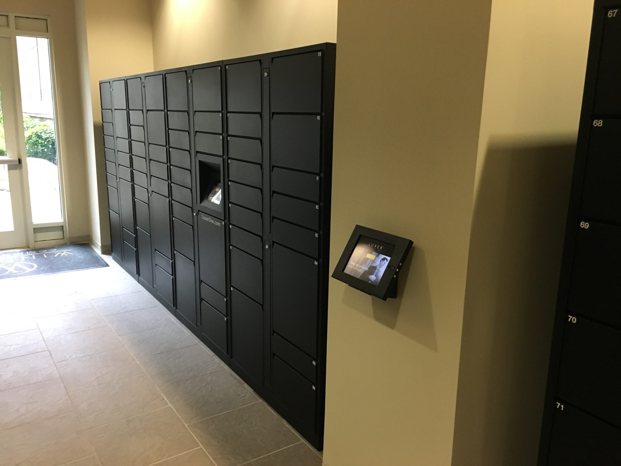 Luxer One Parcel Lockers with Luxer Room LCD on Wall