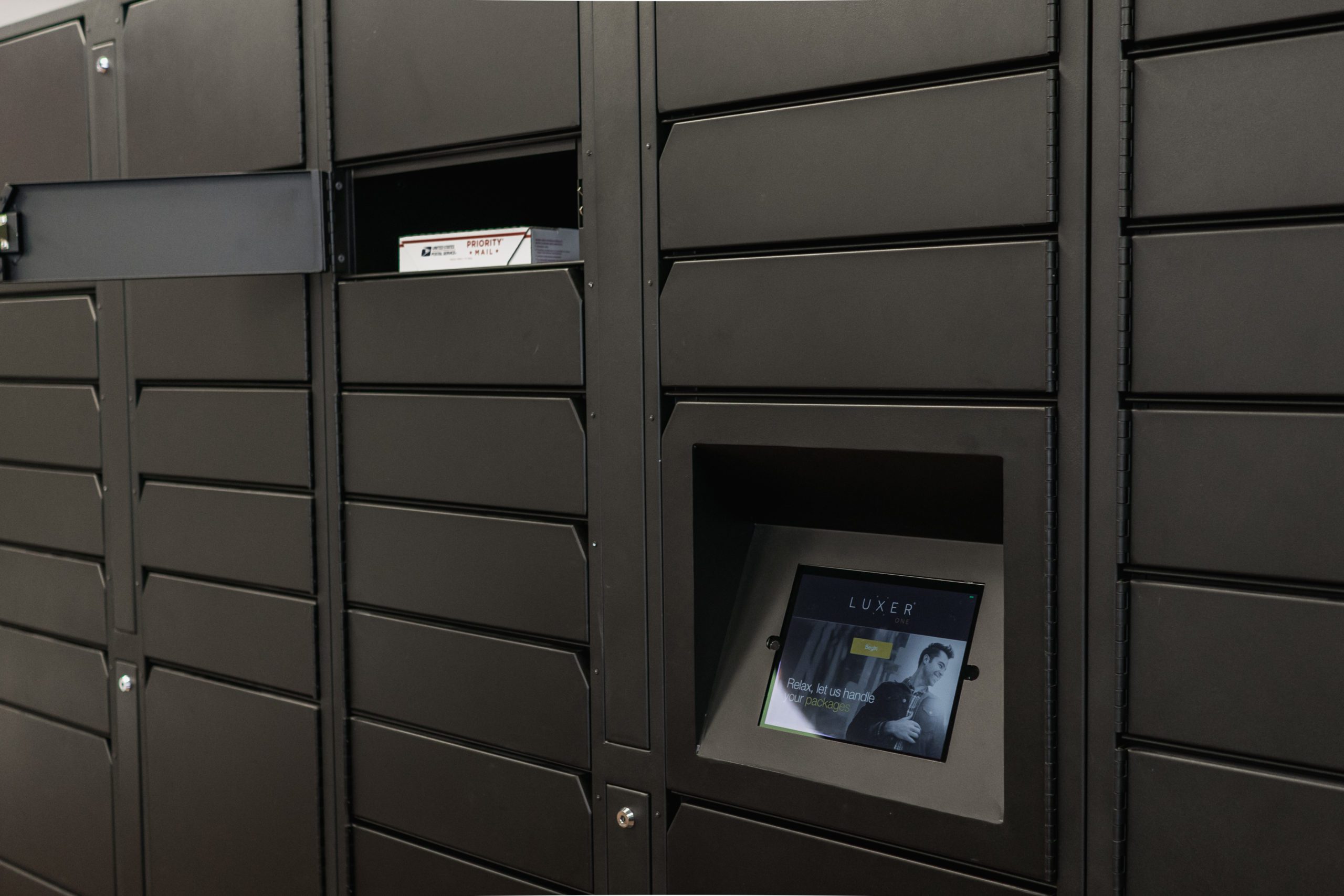 Luxer Parcel Locers LCD and Opened Locker